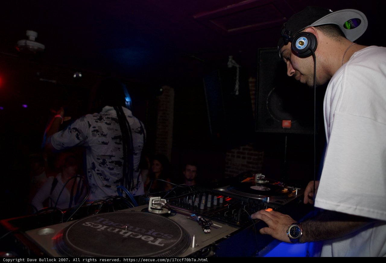 DJ in White: Grooving to the Beat