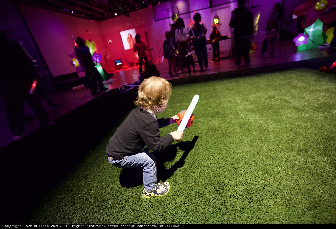 Child with Light Stick at Baby Rave Event