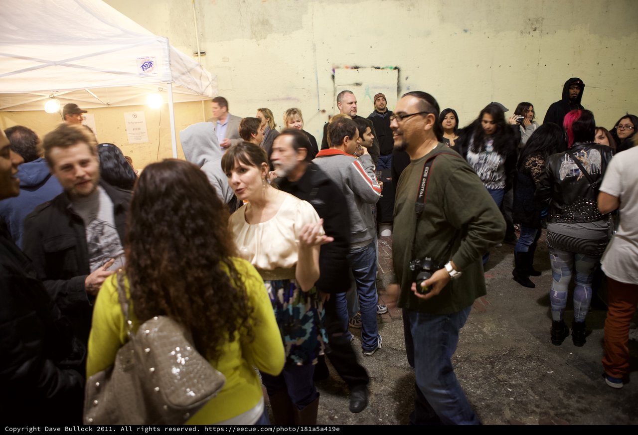 Crowded Indoor Wine Party Gathering at Night