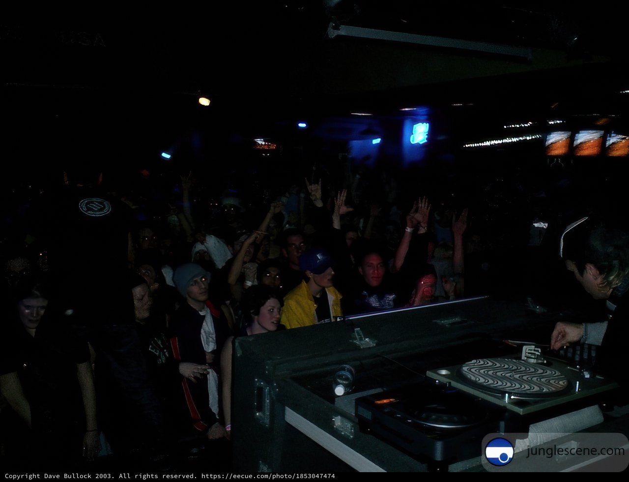 Nightclub DJ Setting the Night on Fire