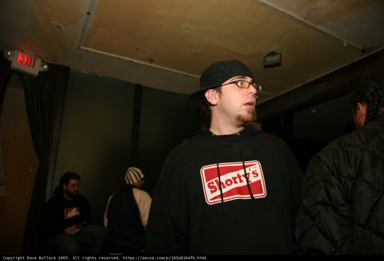 Man in Black Hoodie and Glasses