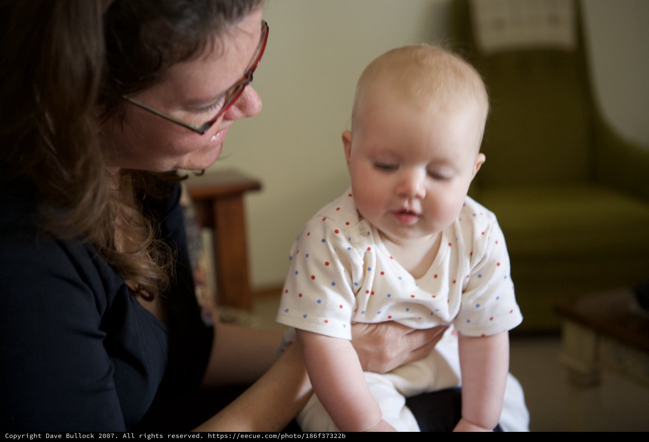 Parent and Baby Share a Tender Indoor Moment