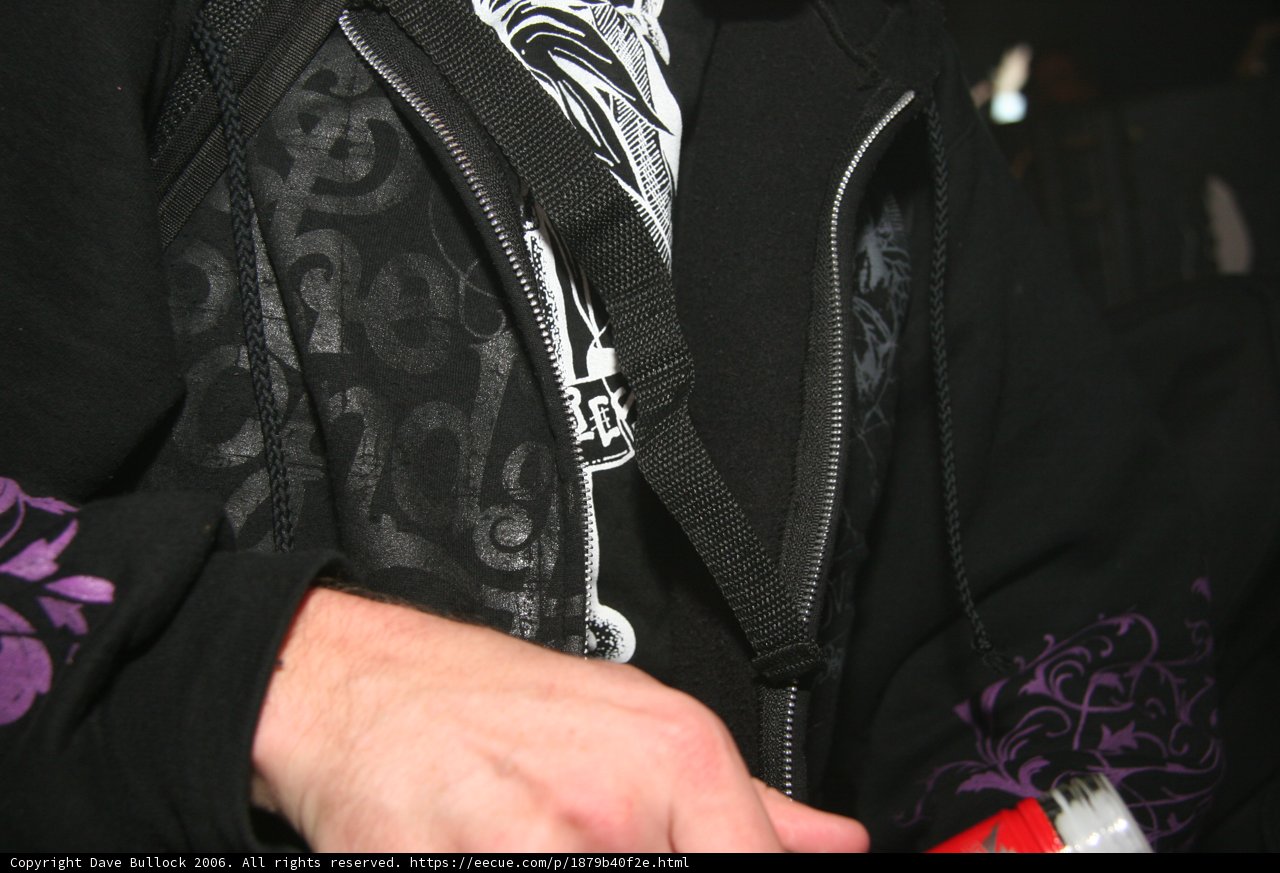 Stylish Man in Black Jacket and Red Hat