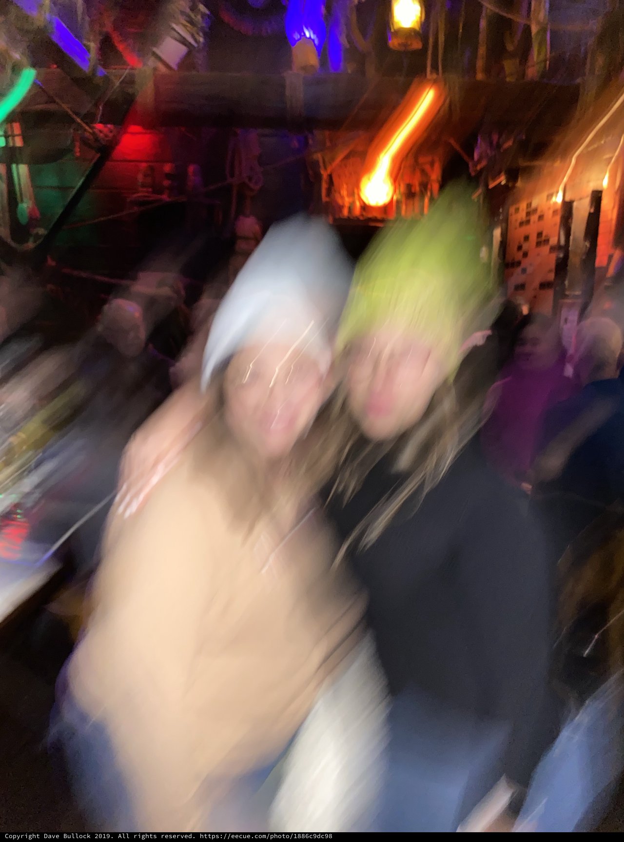 Motion Blur Selfie in Vibrant Nightclub Setting