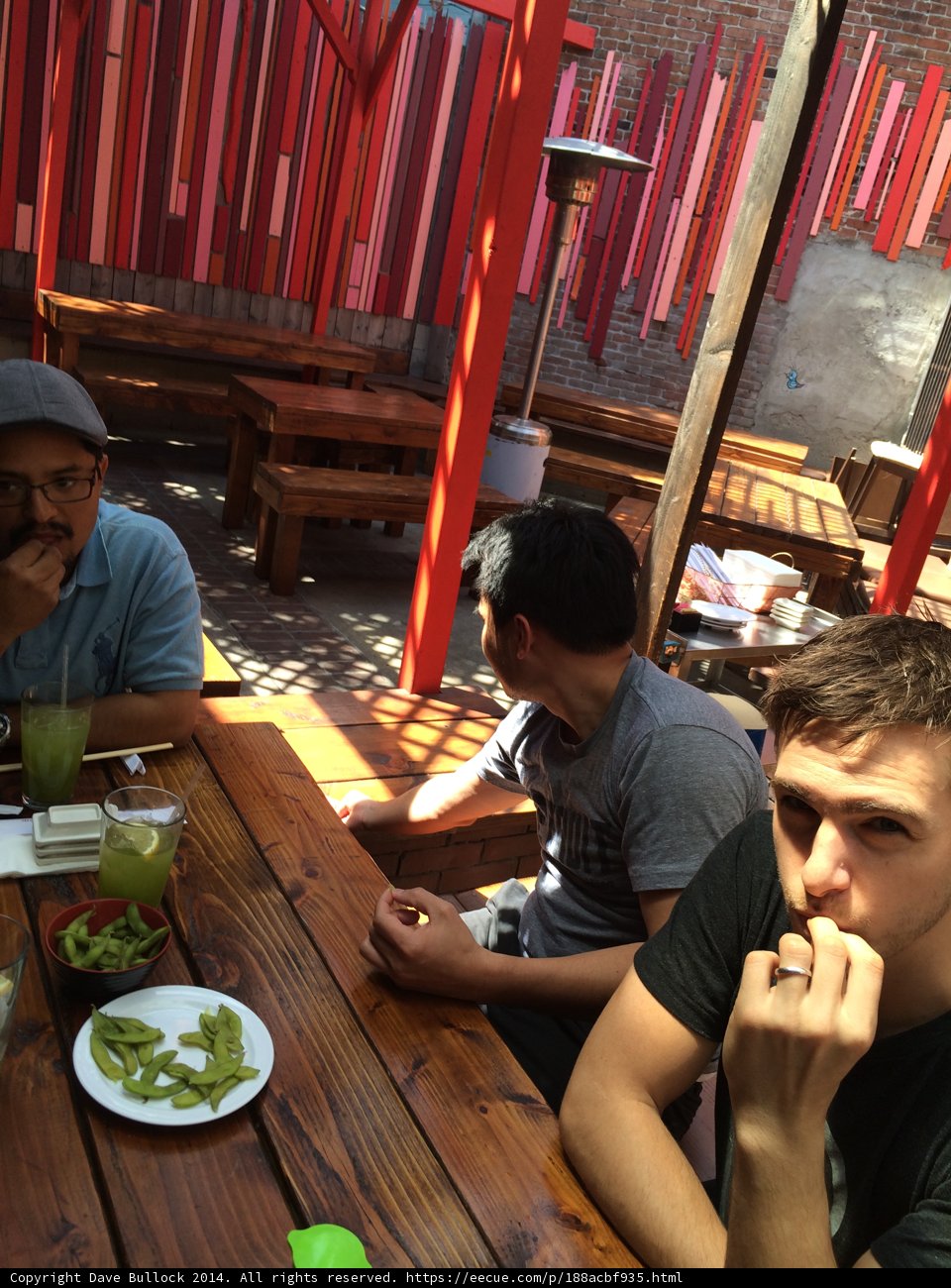 Three Men Lunching at a Cafe