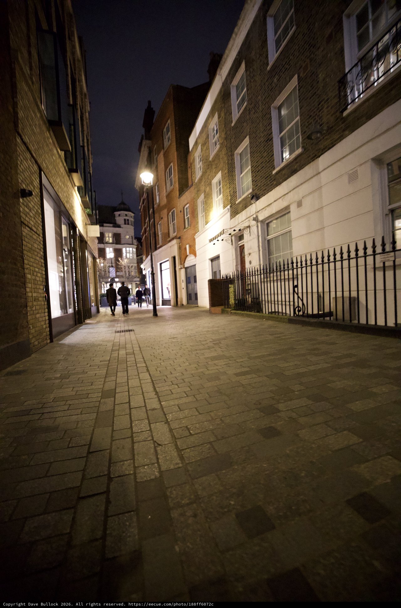 Illuminated Victorian Street Scene at Night in London