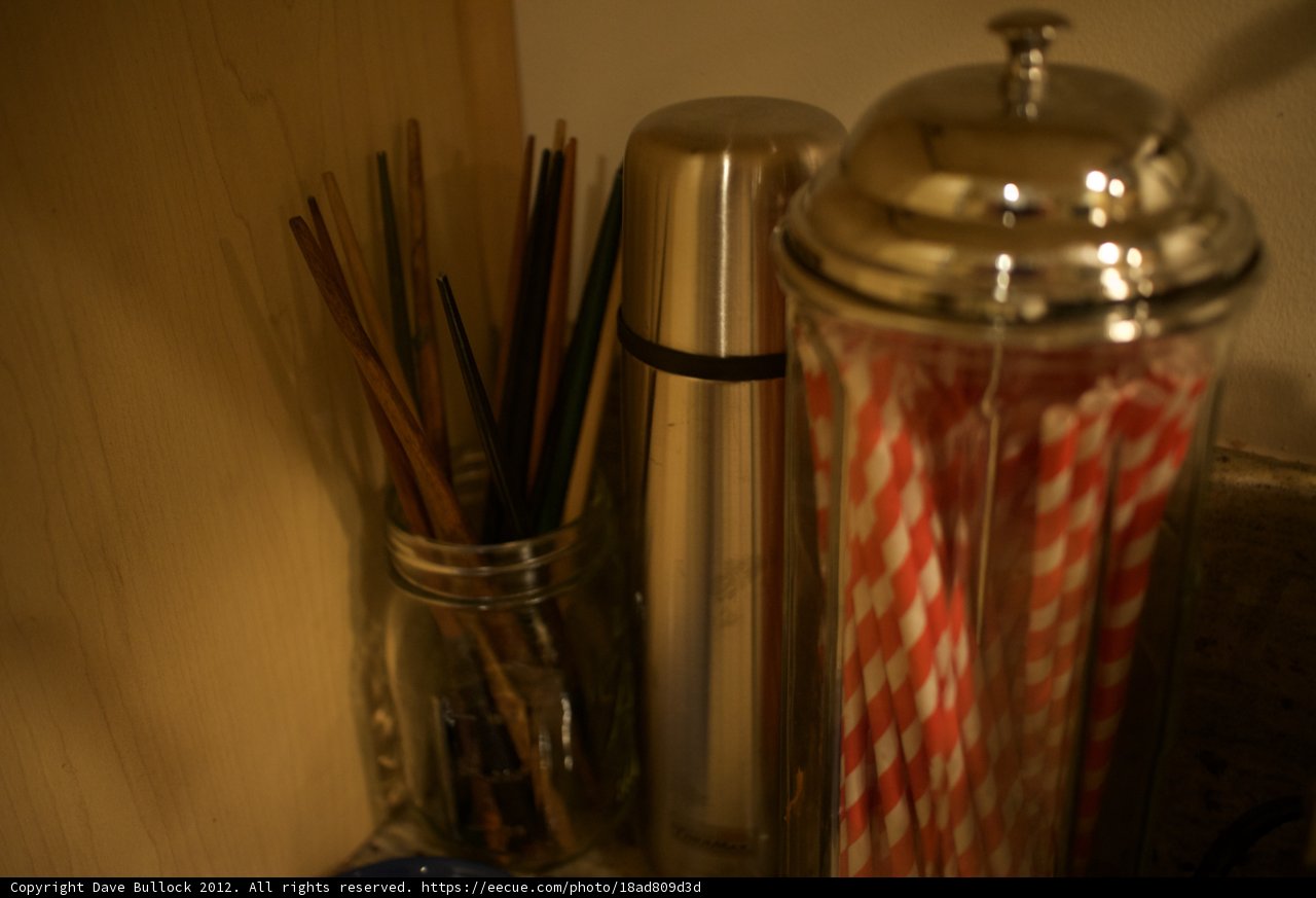 Pottery Jar and Bottle on Shelf