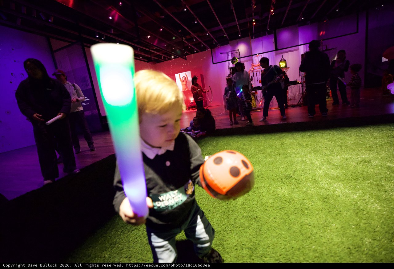 Child with Glow Stick at Baby Rave Event