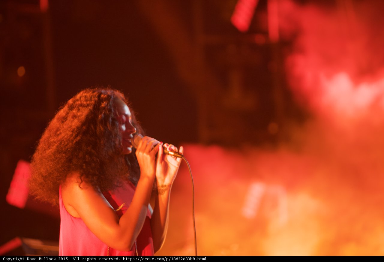 Solange Profile Smiling Singing Red Orange Haze Warm