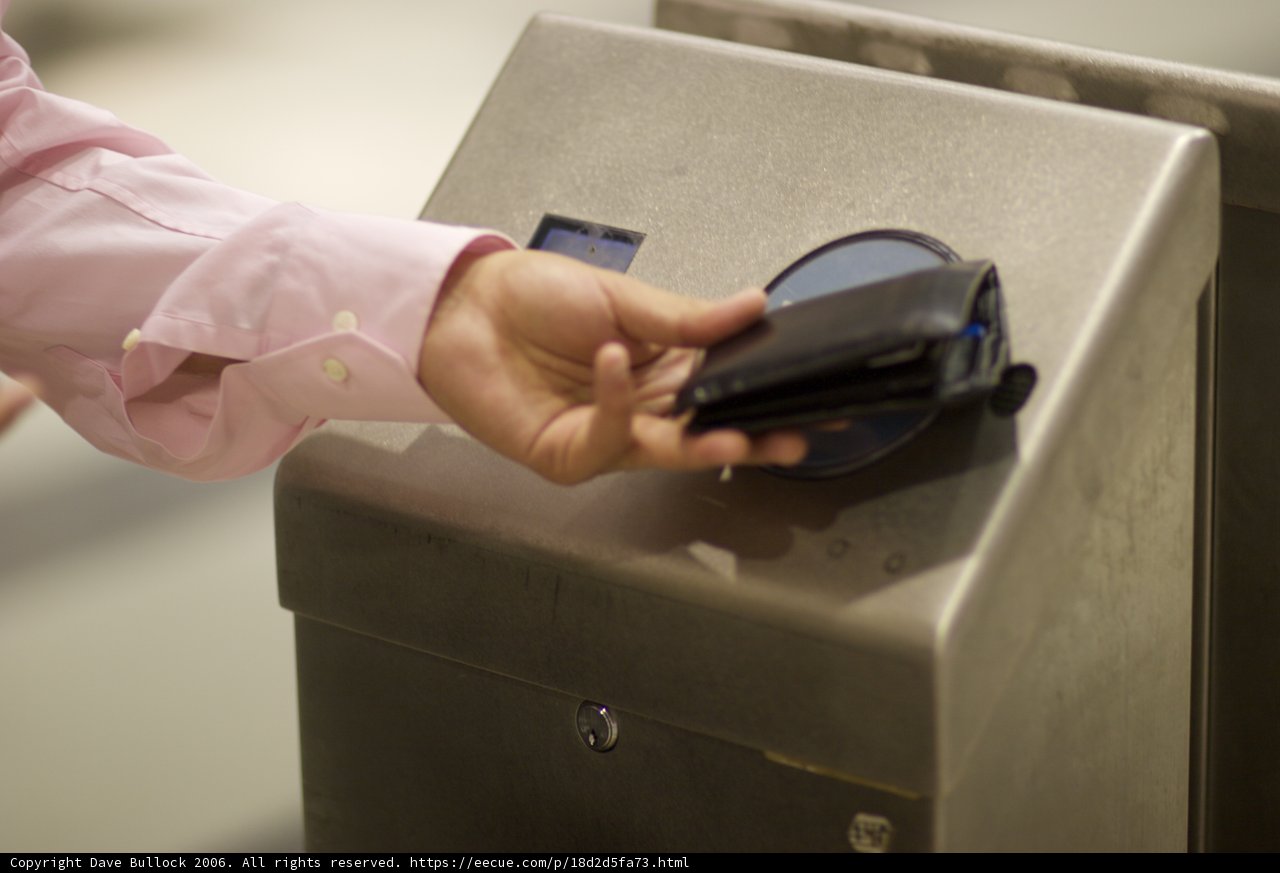 Inserting Money into a Consumer Electronic Machine