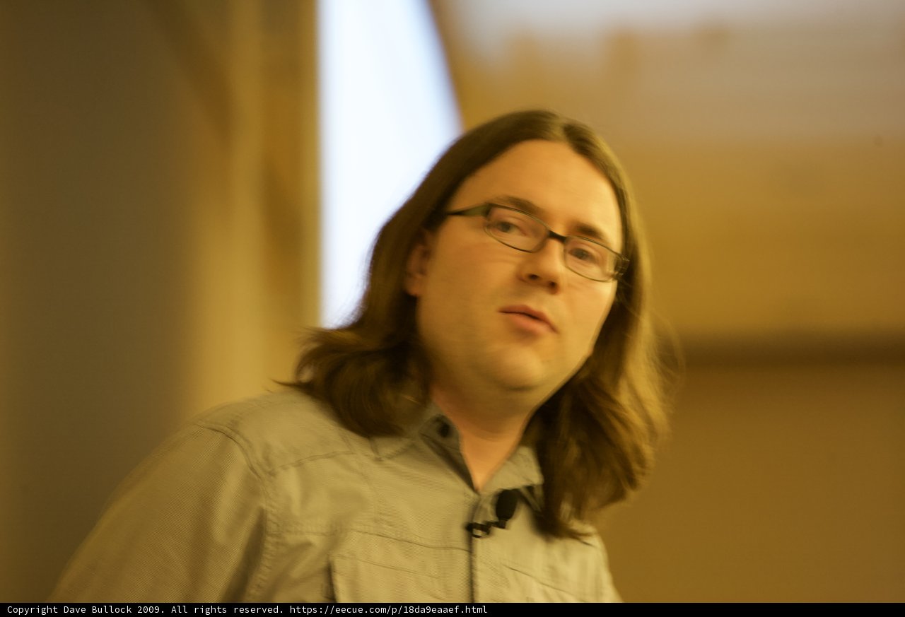 Long-Haired Man in Dress Shirt and Glasses