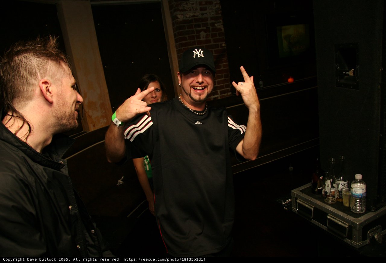 Backstage Laughs with Friends at Nightclub Event