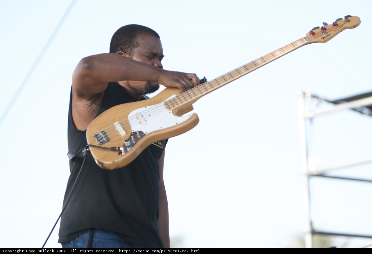 Musician Strums Electric Guitar at Coachella Festival