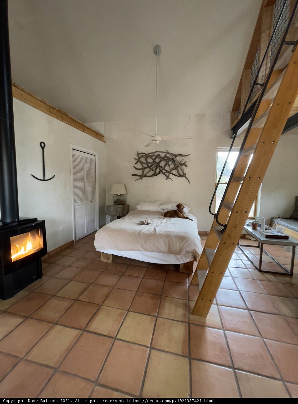 A Cozy Bedroom with Wood-Fired Warmth