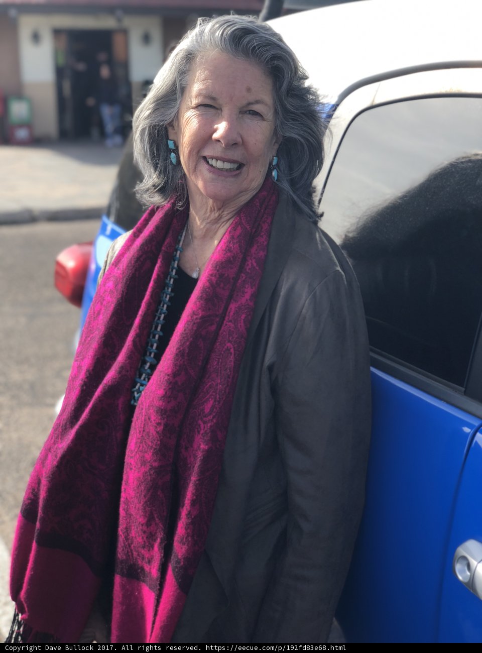 Blue Car and Happy Woman