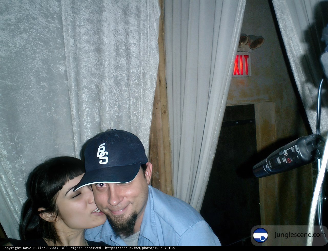 Kissing in the Photo Booth
