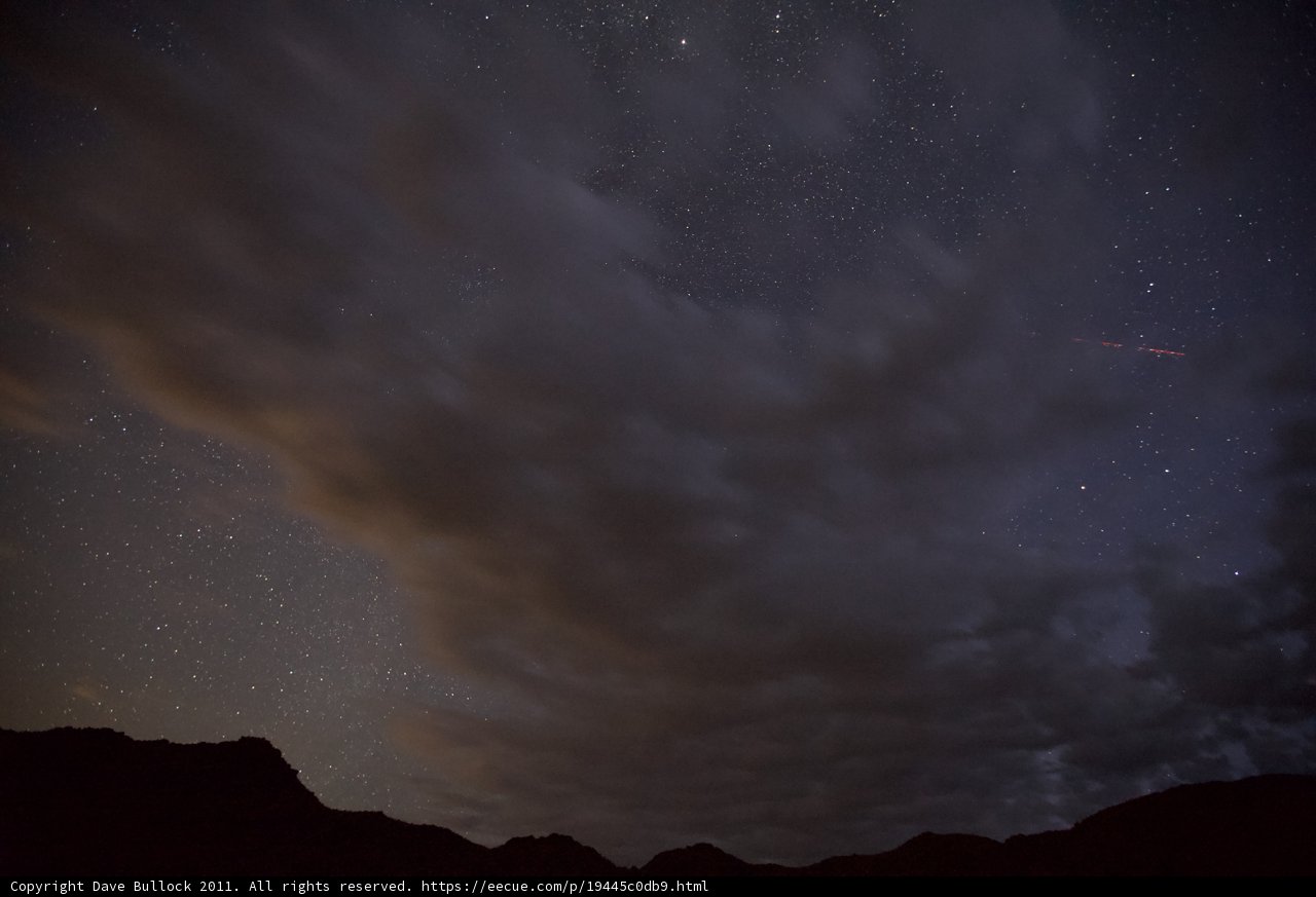 Shooting Star over the Mountain Range