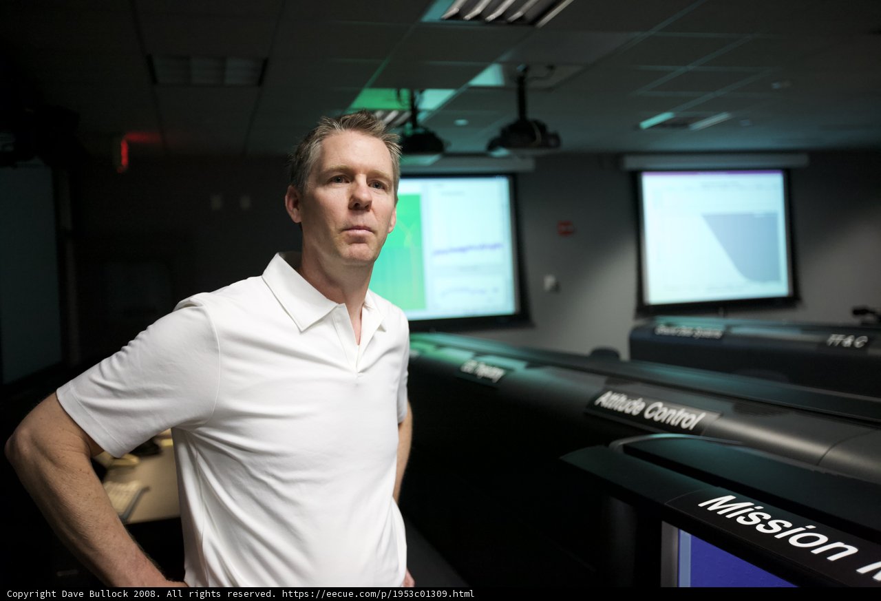 Standing Tall in Front of Large Screen