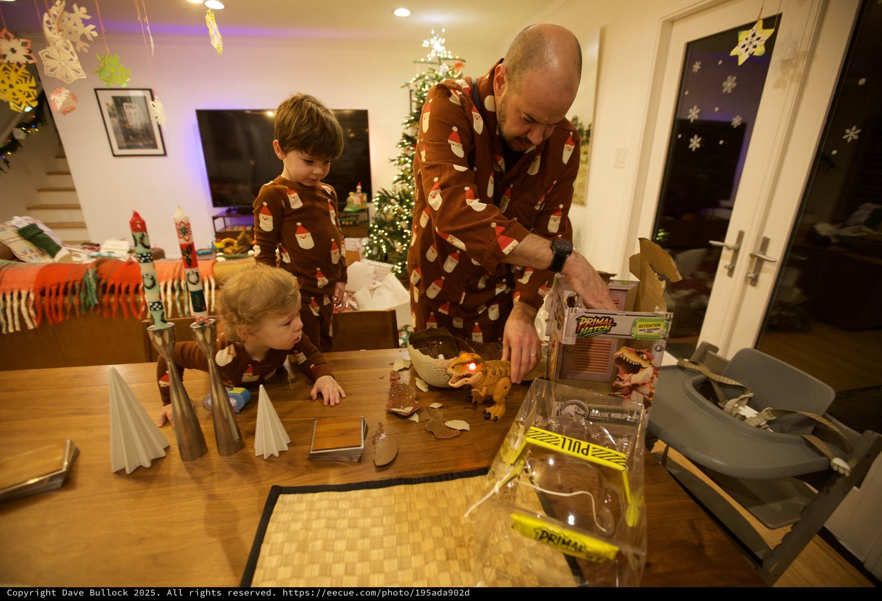 Family Christmas Gingerbread House Crafting Together