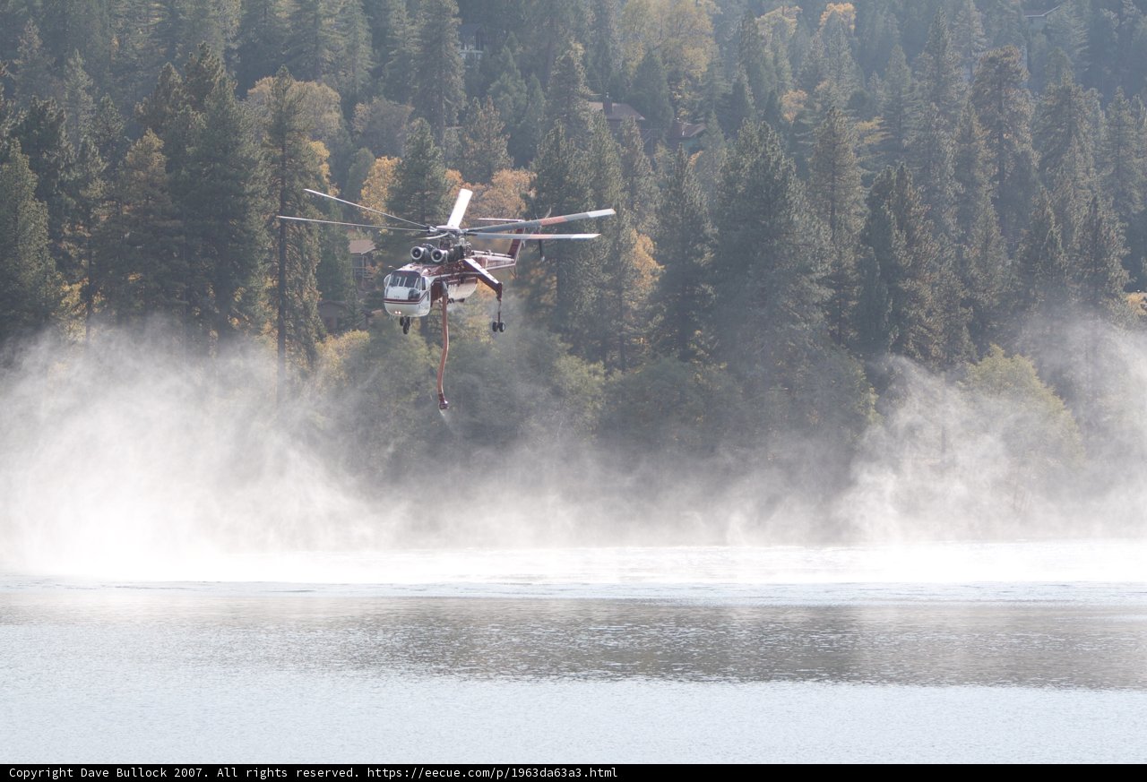 Helicopter and Fire Truck Over Lake
