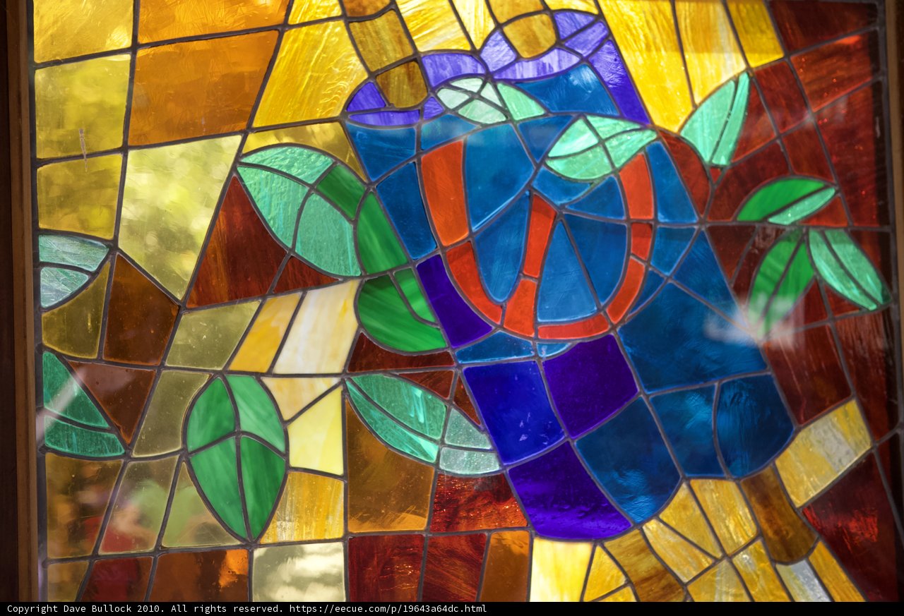 Blue and Green Stained Glass Artwork