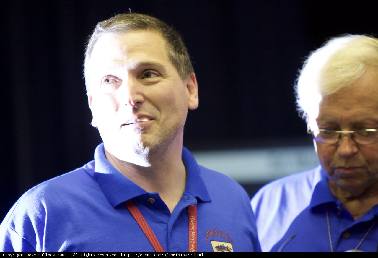 Two Men in Blue Shirts Giving Post-Interview Insights