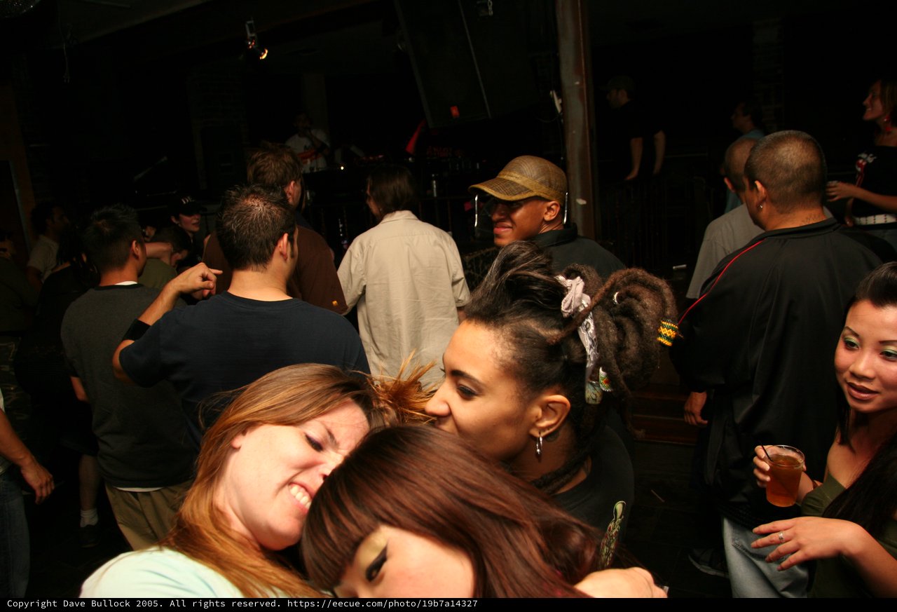 Friends Dancing Together at Lively Nightclub Party