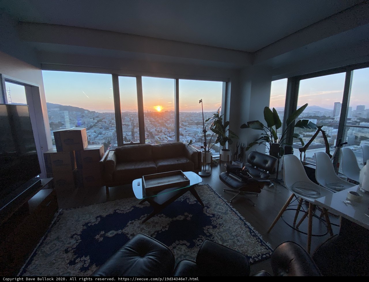Sunset View from a Chic Penthouse Living Room