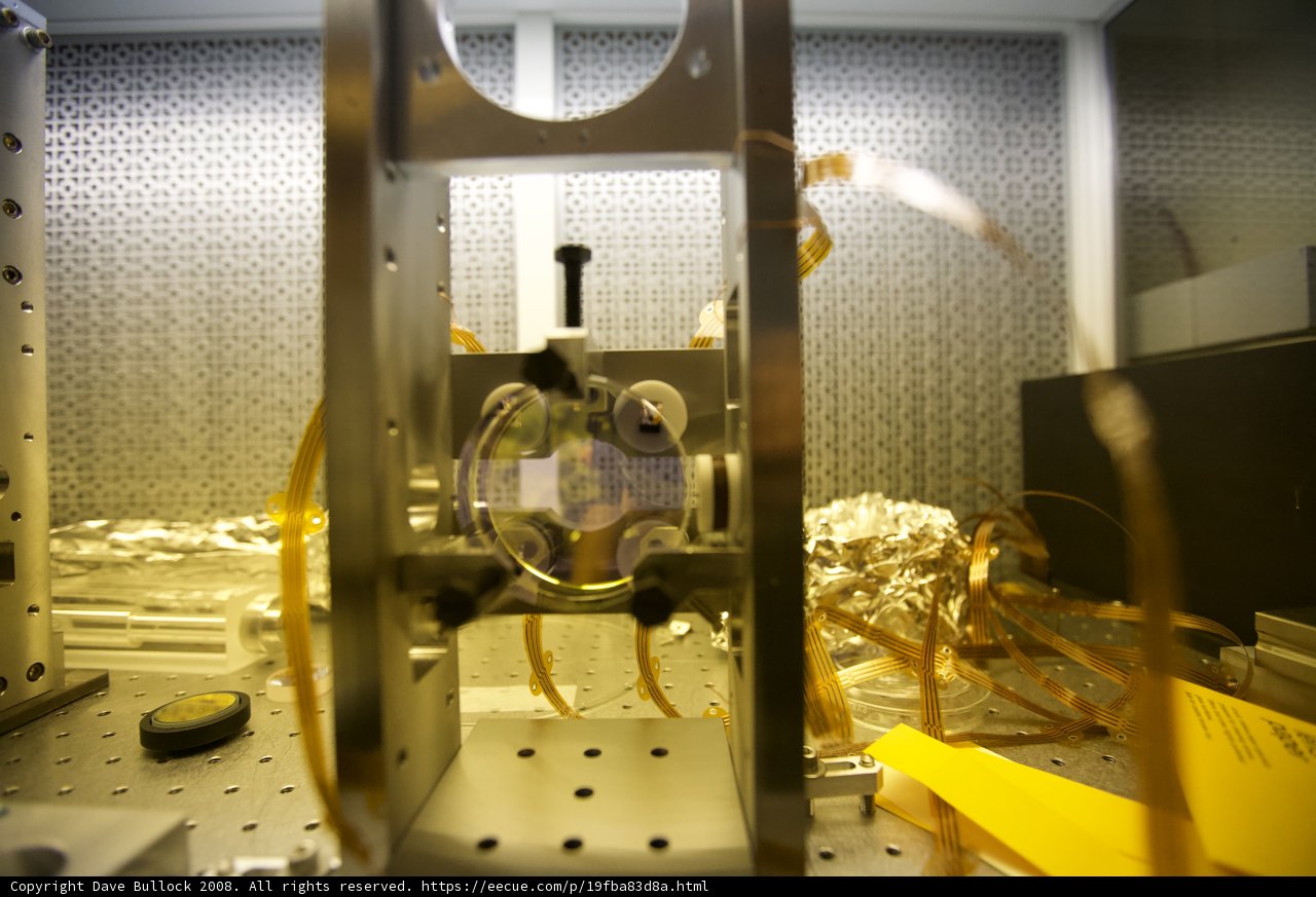 Yellow Object Encased in an Electronic Machine