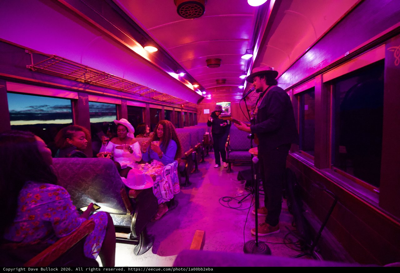 Live Music Performance Inside Illuminated Train Car