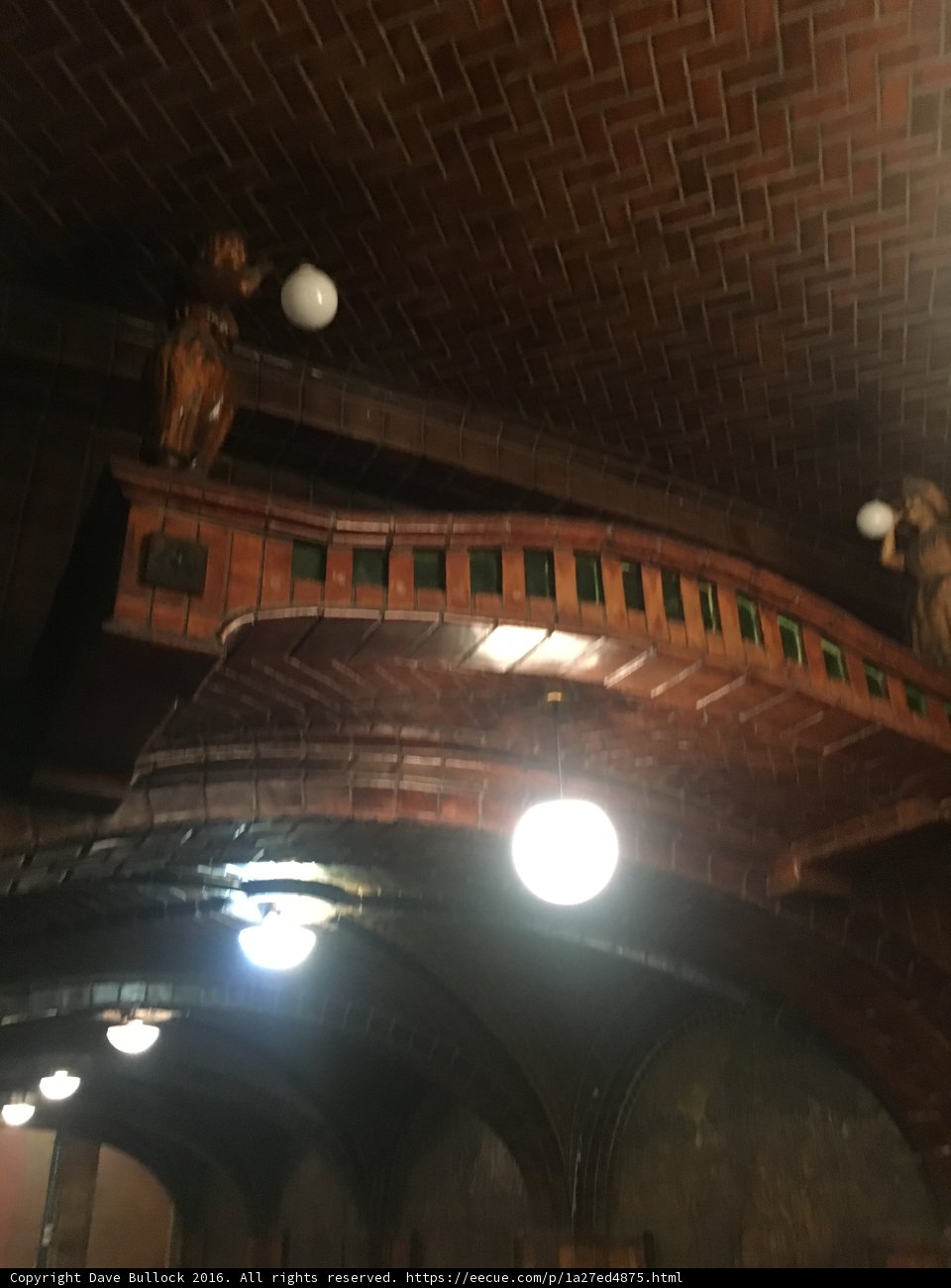 Illuminating Statues in a Brick Ceiling