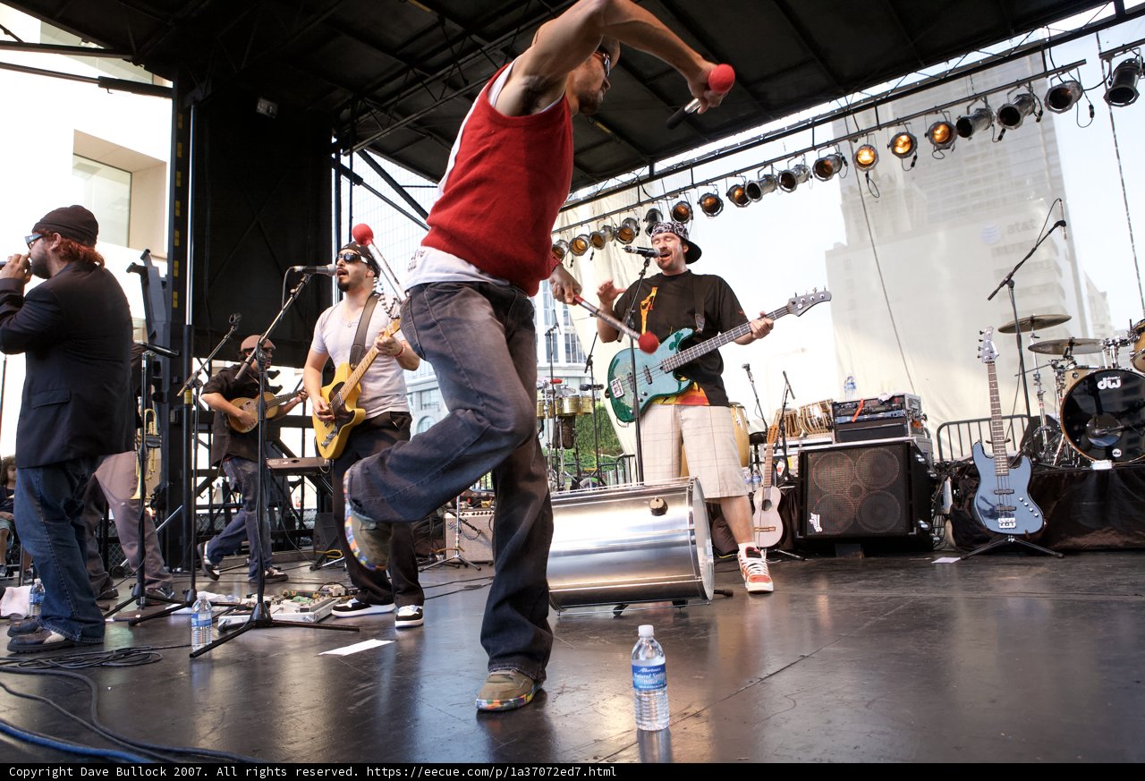 Red-Shirted Performer Rocks the Stage