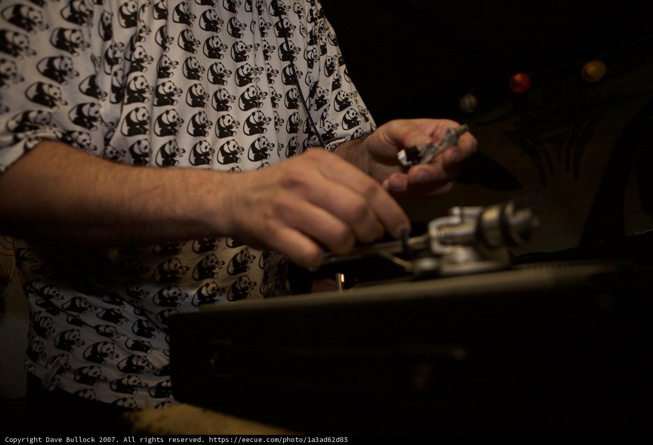 Repairing the Beat: A Man Fixes a Record Player