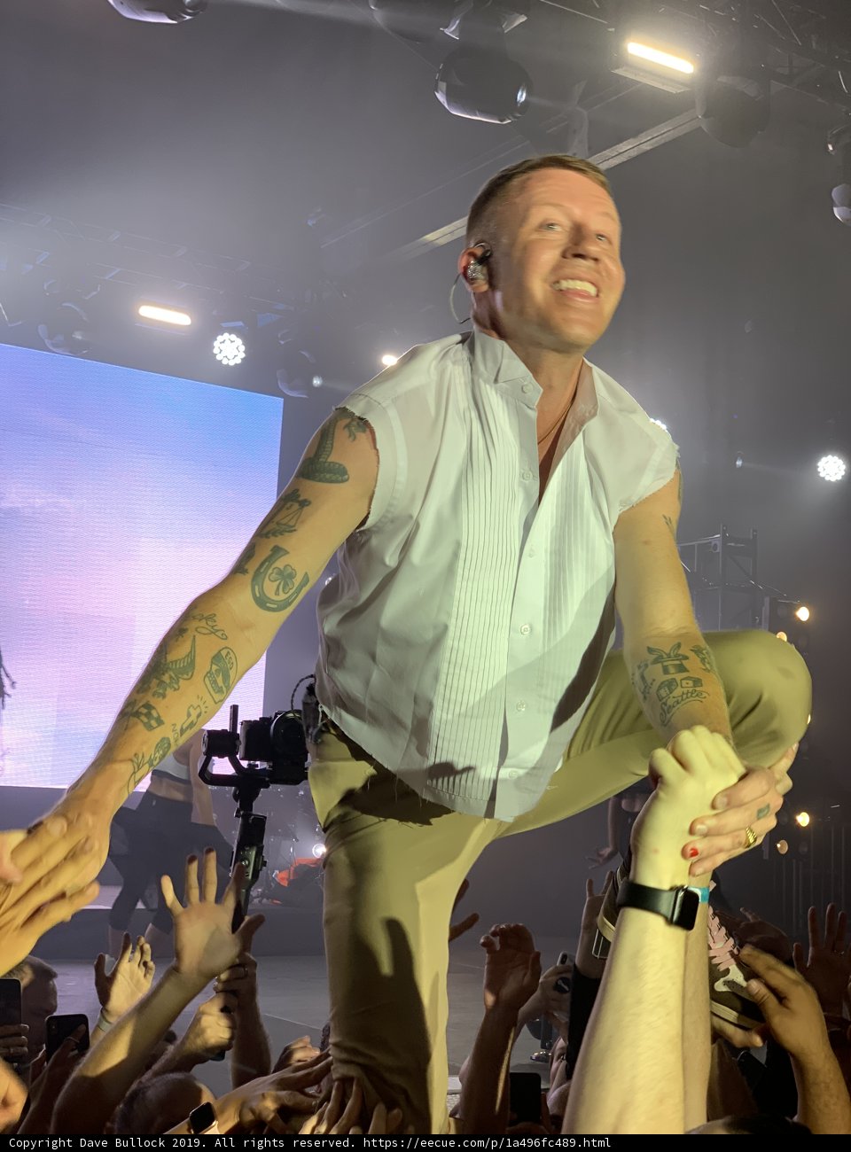 Tattooed Macklemore Performing on Stage