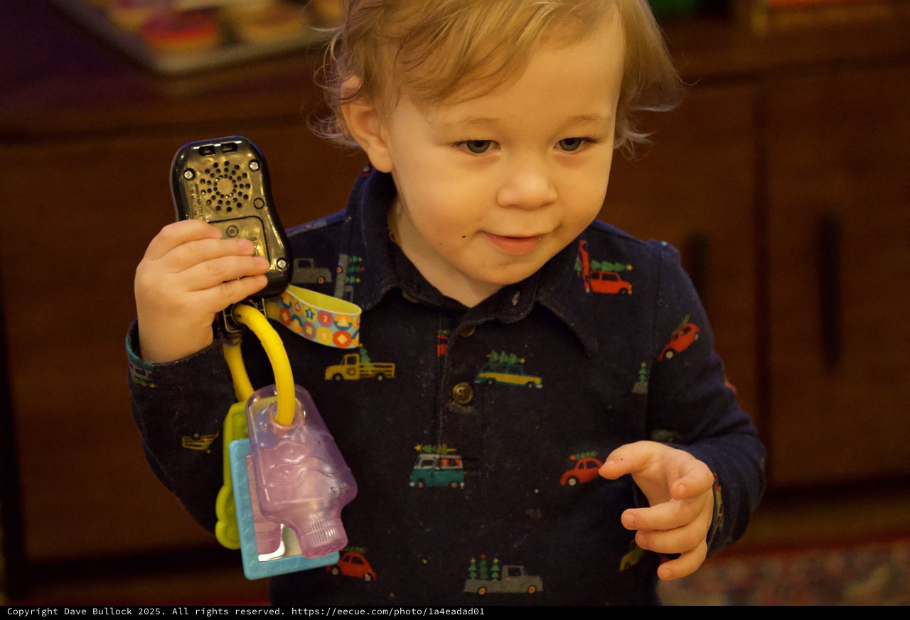 Toddler Playing with Toy Phone on Christmas