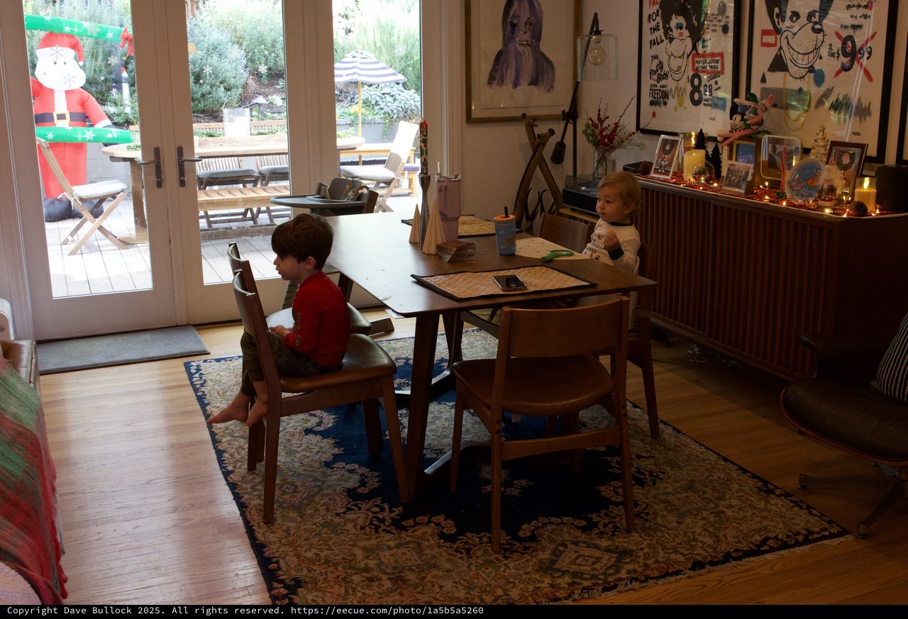 Children at Homework Table During Christmas Season