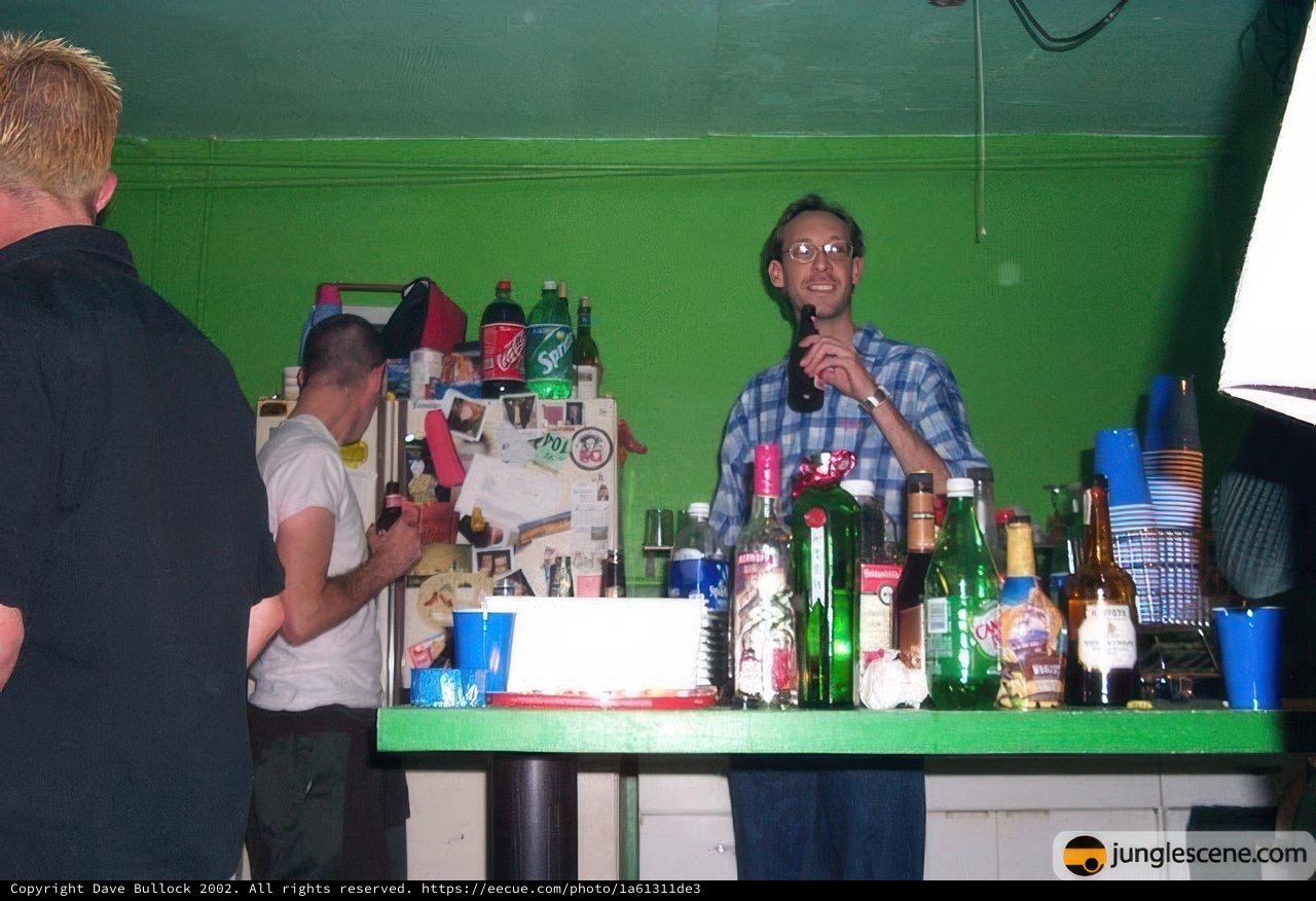 Man Enjoying a Drink at the Bar