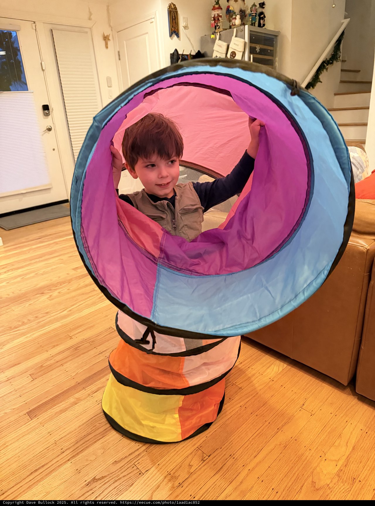 Child Playing in Colorful Pop-Up Tunnel Toy