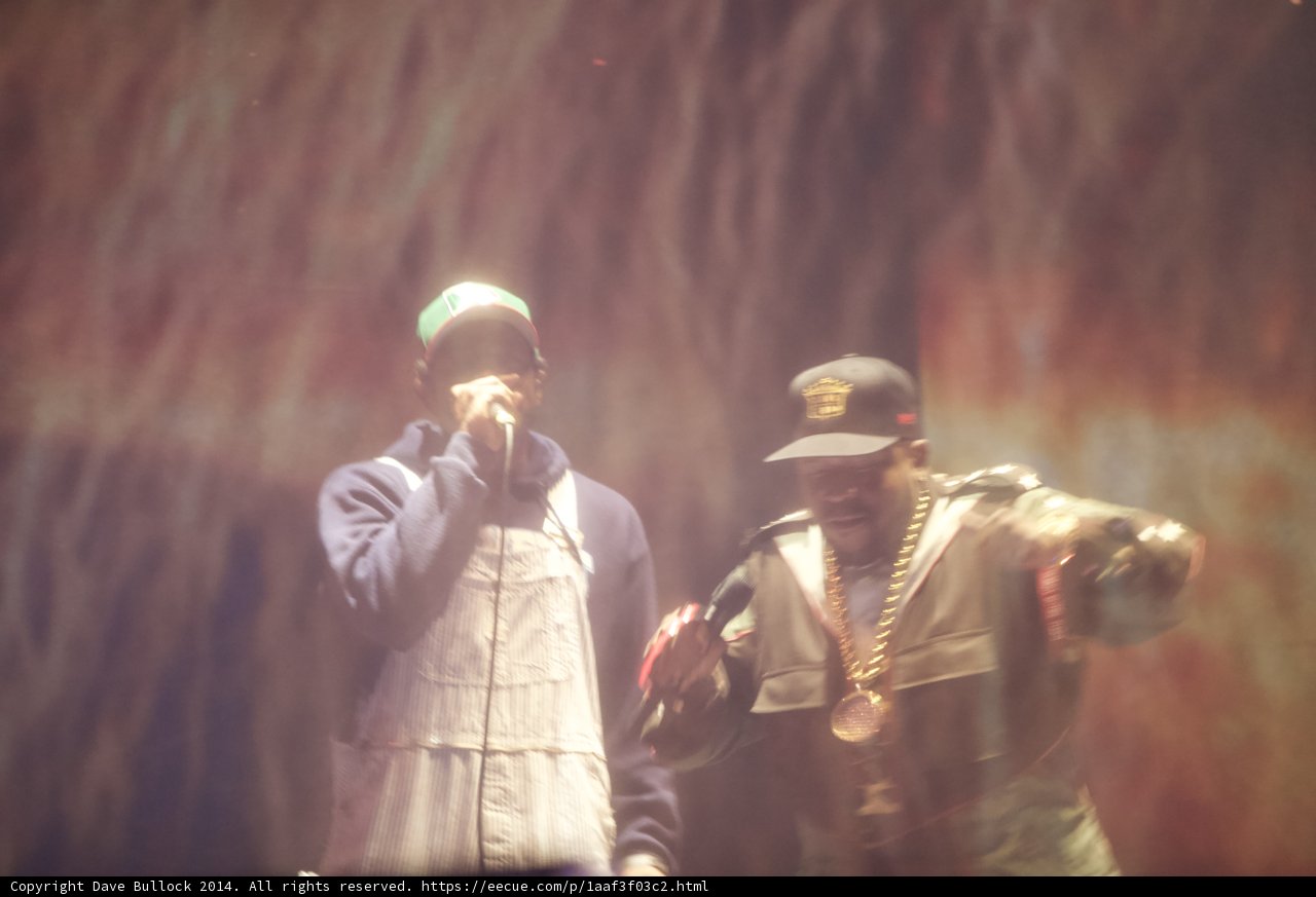 Two Men Rocking the Stage with Their Microphone