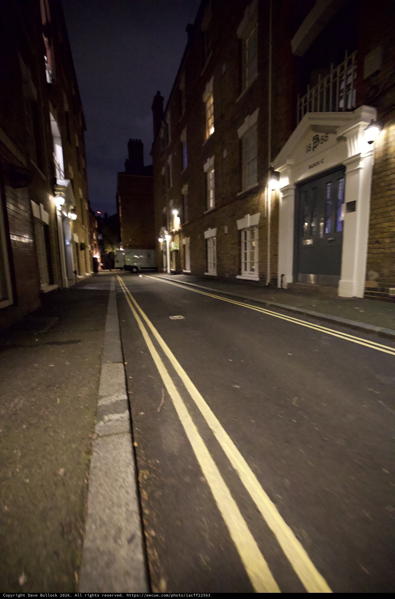Quiet London Street Illuminated at Night