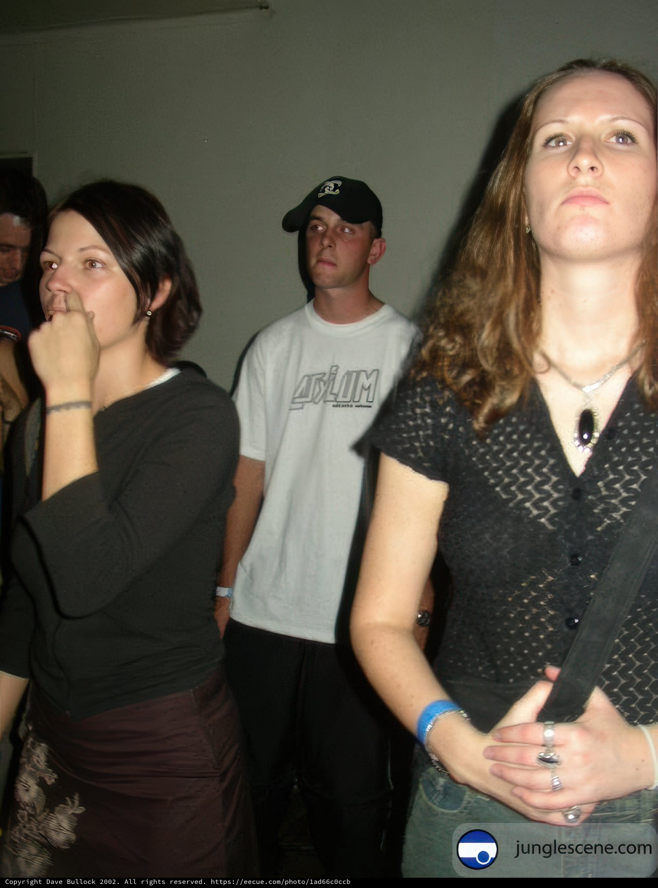 Woman in Black Shirt with Baseball Hat