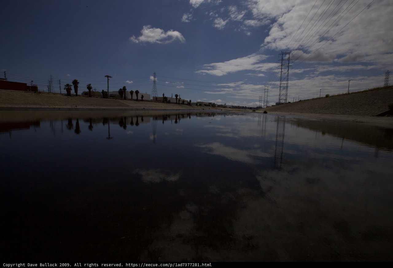 Sky Reflection in Puddle