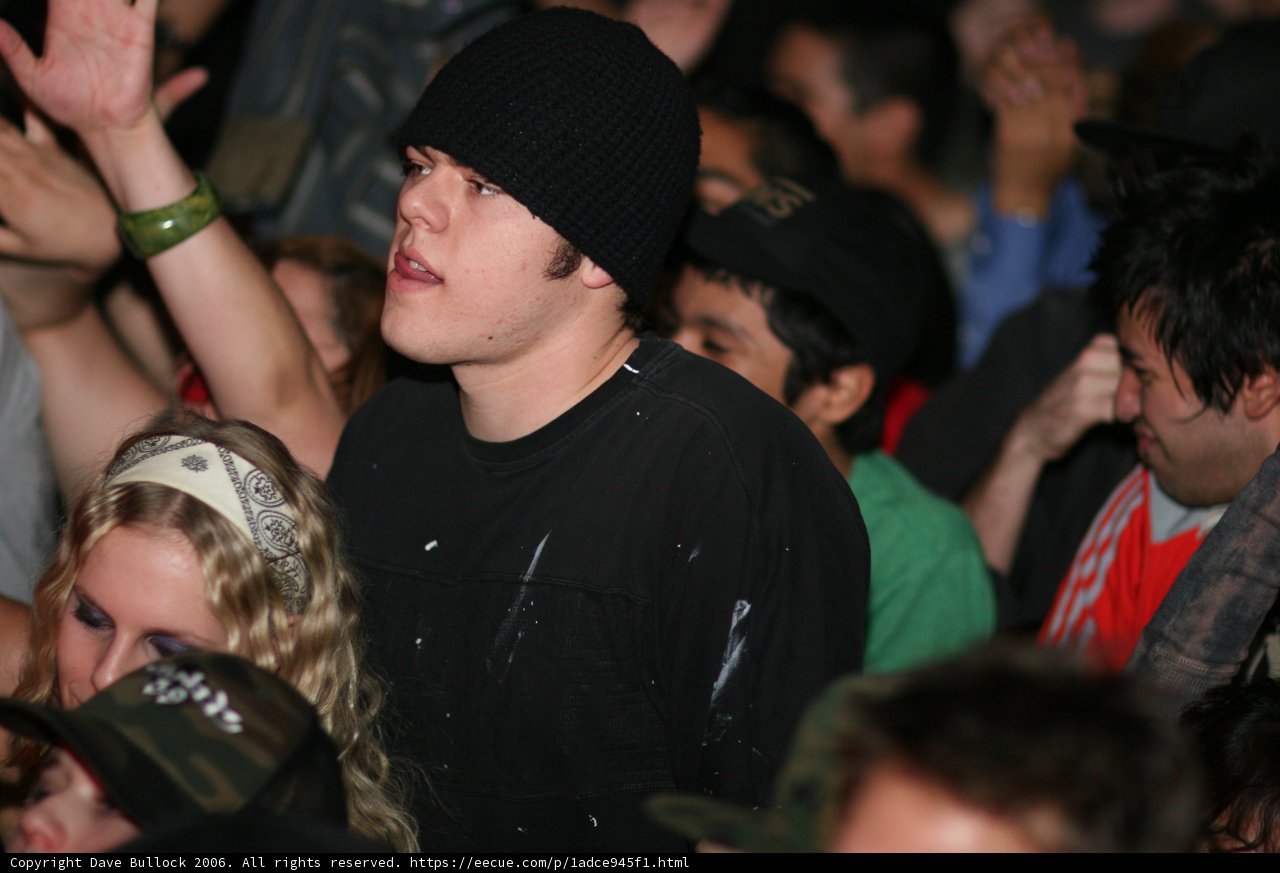 Black hat in a sea of headgear