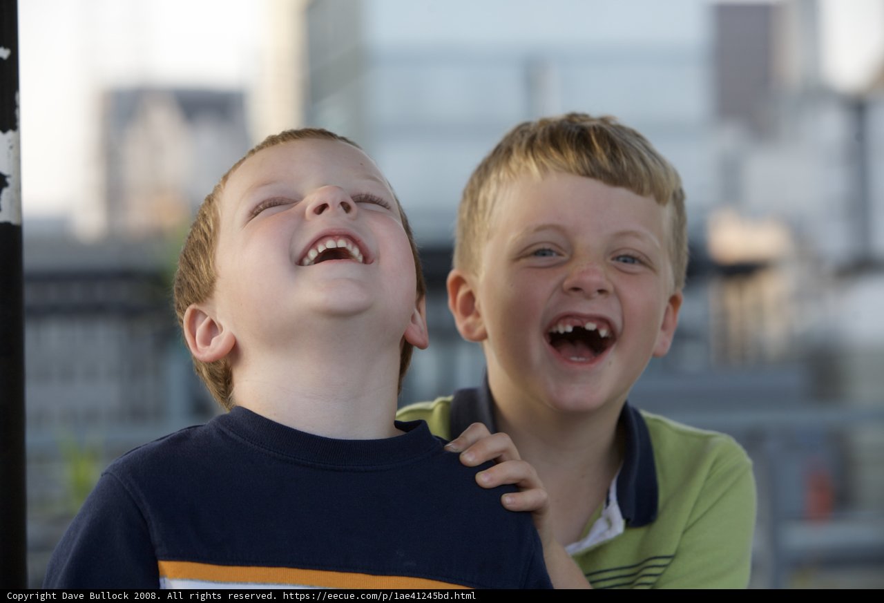 Two Boys Sharing Laughter Together