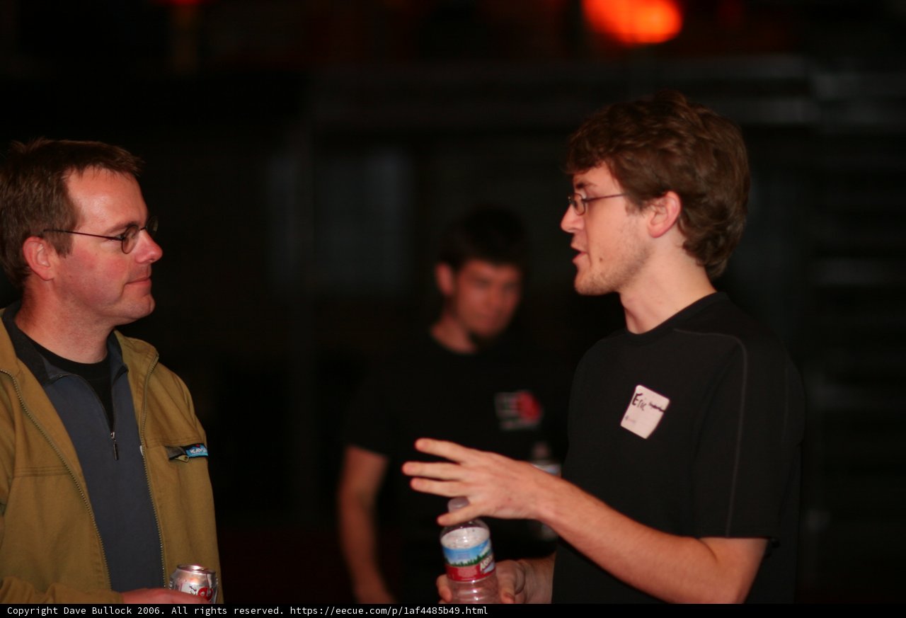 Two Men Enjoying Drinks and Conversation at BarCamp 2006