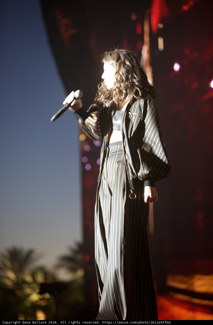 Stripes and Sound: A Woman's Performance on Stage