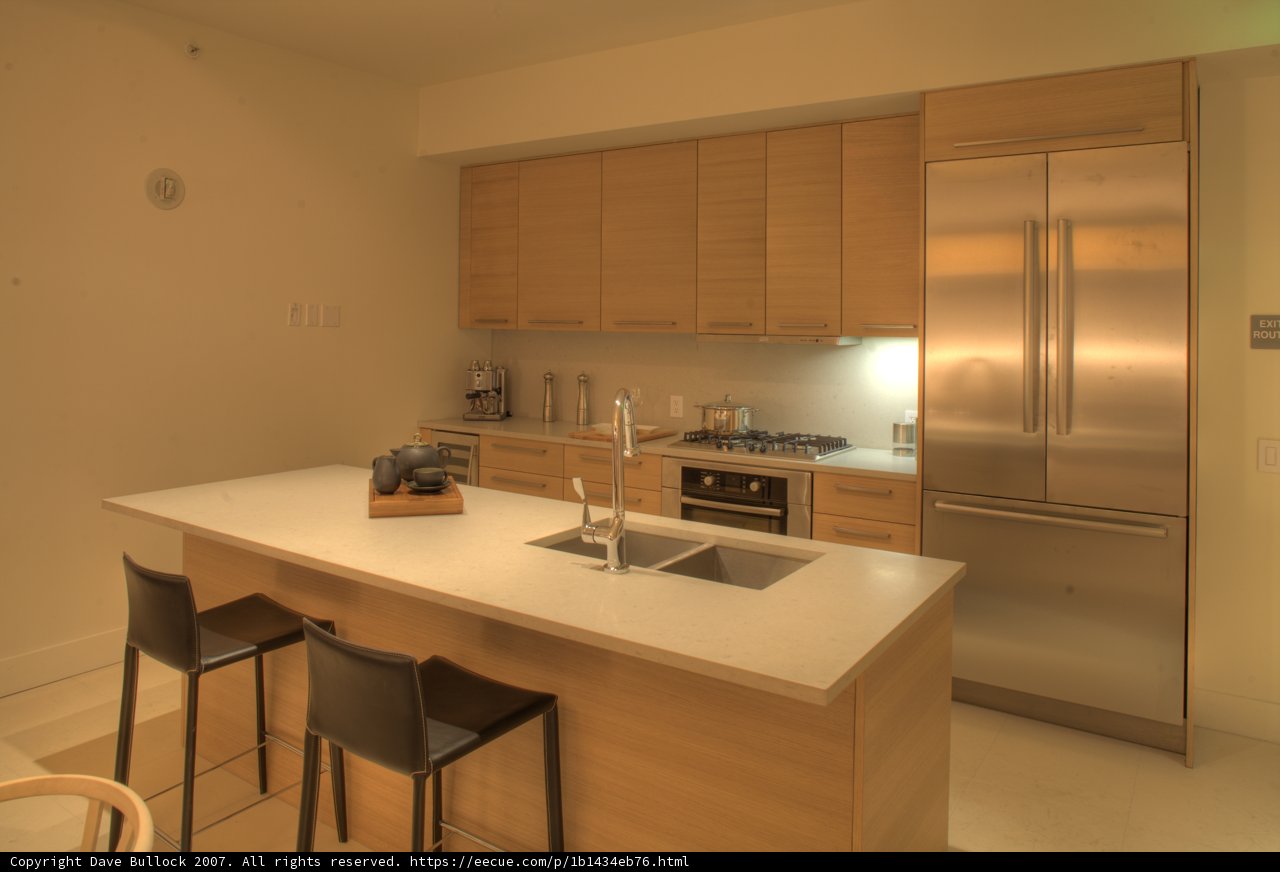 Modern Kitchen with Wooden Cabinets and Stainless Steel Appliances