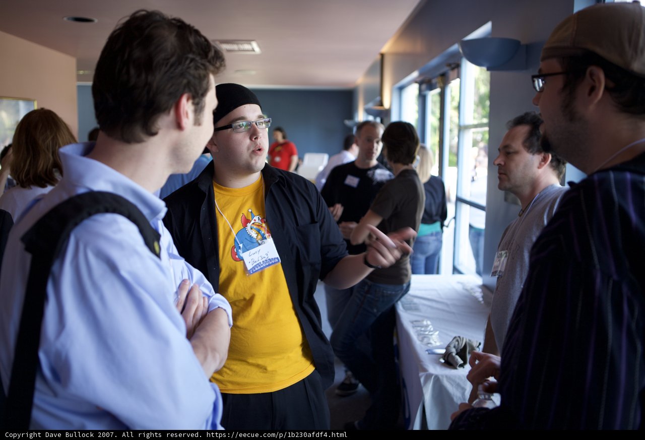 Conference Talks at a Busy Restaurant