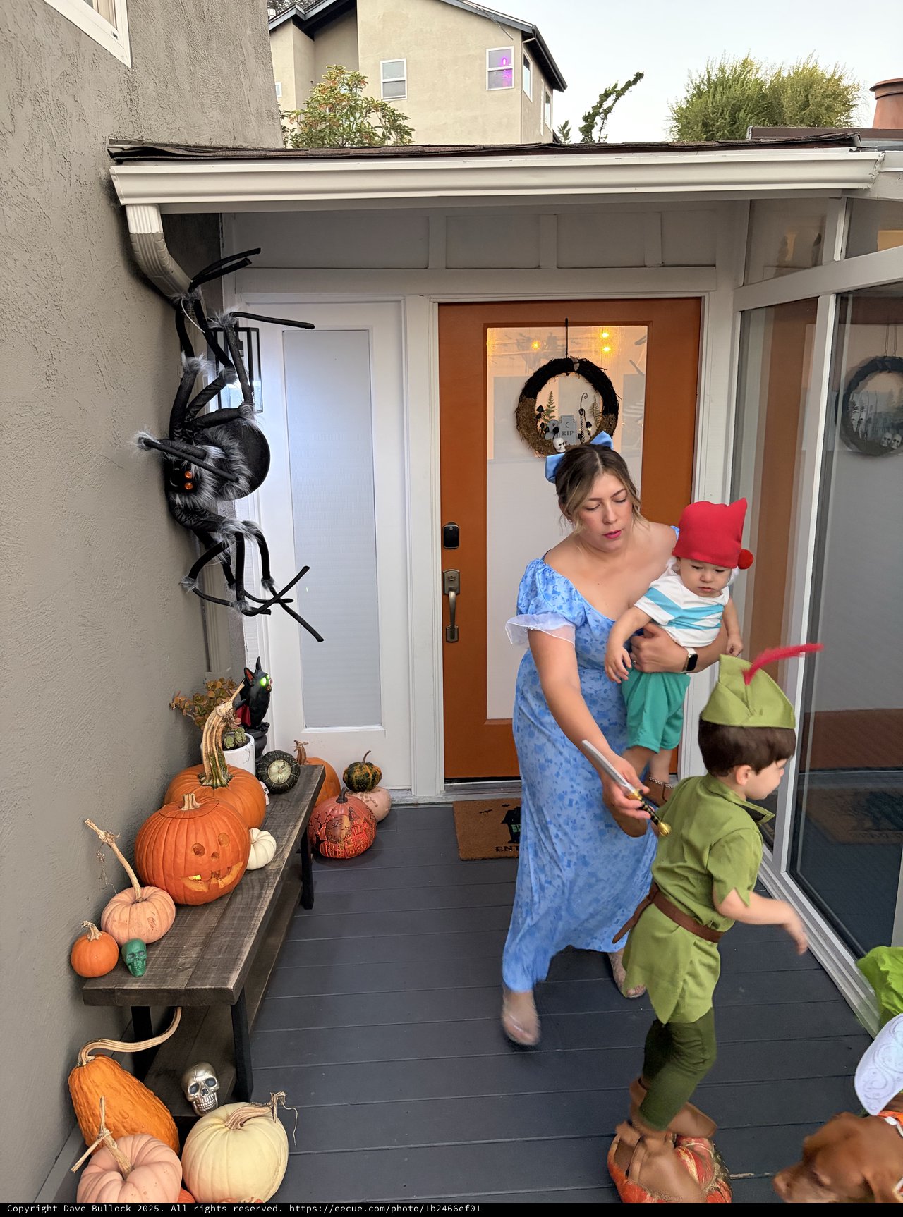 Halloween Family Moment on Decorated Front Porch