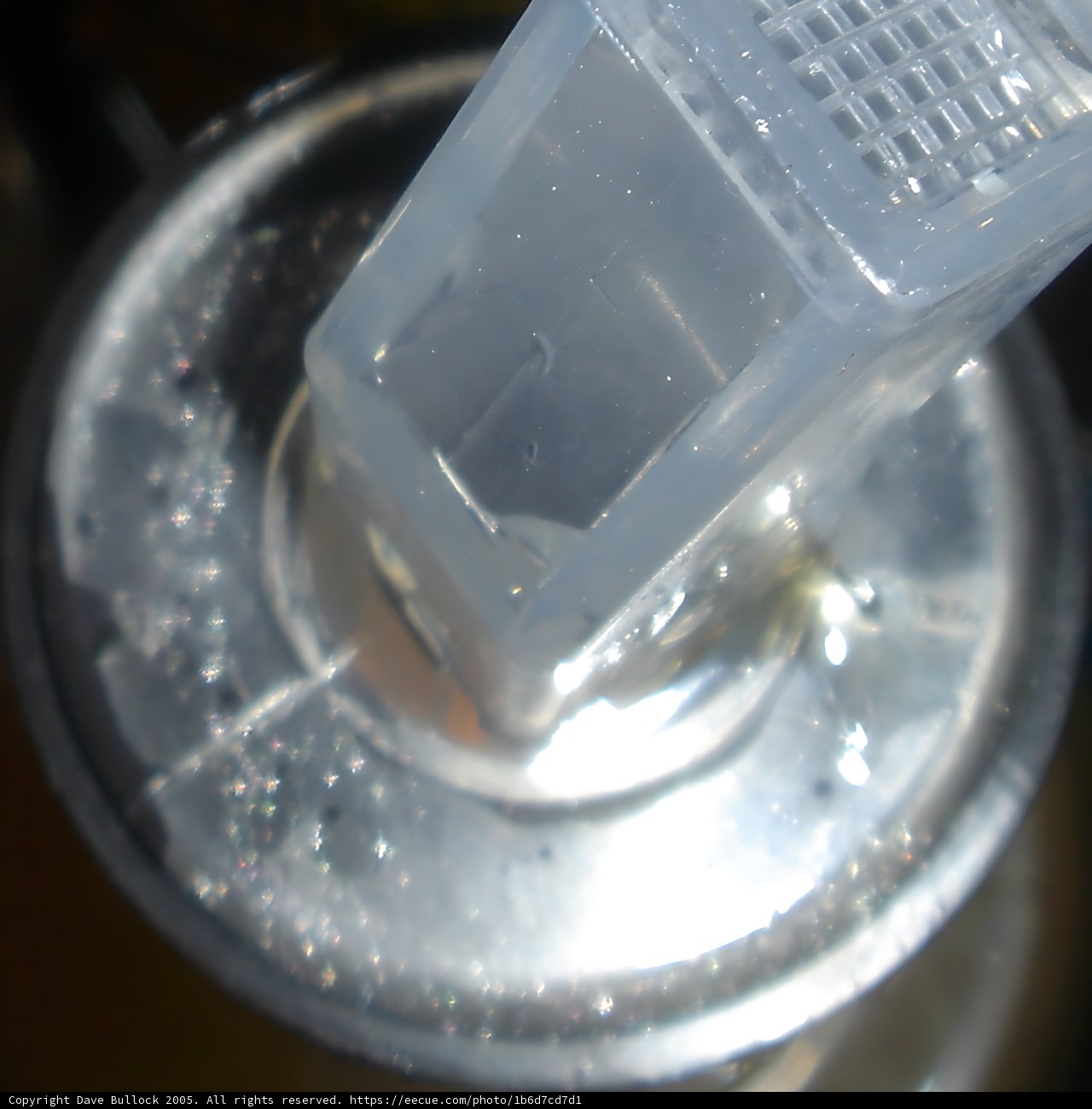 Plastic Container with Protruding Plastic Piece